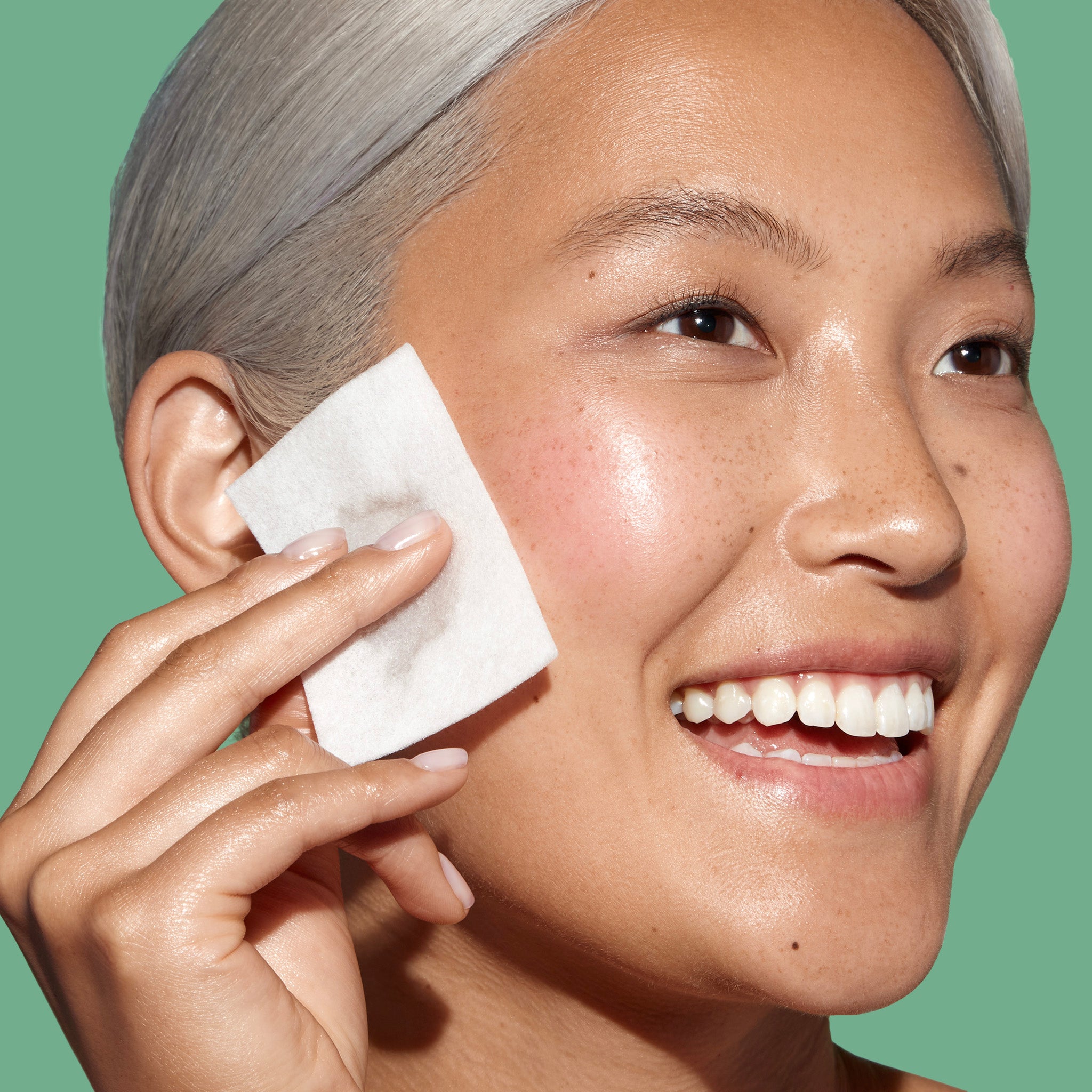 Girl applying Miracle Clear Clarifying Toner